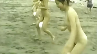 japanese nude girls ball playnig on the beach