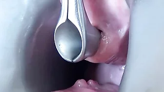 Female masturbate her pee hole with a huge dildo of balls